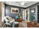 Cozy living room featuring dark grey walls, light floors, and comfortable seating at 4901 North Pointe, Sanford, NC 27332