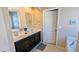 Modern bathroom with double sinks, bathtub, and shower at 508 Stapleford Ln, Fuquay Varina, NC 27526