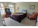 Comfortable bedroom with neutral tones, natural light, and cozy furnishings at 508 Stapleford Ln, Fuquay Varina, NC 27526