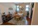 Cozy dining room with hardwood floors and decorative rug at 508 Stapleford Ln, Fuquay Varina, NC 27526