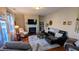 Inviting living room with fireplace and hardwood floors at 508 Stapleford Ln, Fuquay Varina, NC 27526
