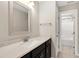 Bathroom featuring vanity, marble countertop, and a framed mirror at 5439 Cokesbury Rd, Fuquay Varina, NC 27526