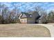 Spacious home with a three-car garage on a sprawling lot at 5439 Cokesbury Rd, Fuquay Varina, NC 27526