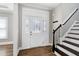 Inviting foyer features beautiful floors and staircase, creating an elegant entrance to the home at 5439 Cokesbury Rd, Fuquay Varina, NC 27526