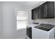 Laundry room featuring a modern washer and dryer set at 5439 Cokesbury Rd, Fuquay Varina, NC 27526