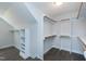 Walk-in closet with ample space and rods at 5439 Cokesbury Rd, Fuquay Varina, NC 27526