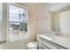 Well-lit bathroom features a modern vanity, toilet, mirror and a window offering natural light at 6800 Franklin Heights Rd, Cary, NC 27518