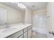 Bathroom featuring double vanity and a shower/tub at 6800 Franklin Heights Rd, Cary, NC 27518