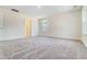 Bedroom featuring neutral carpet, natural light, and classic trim at 6800 Franklin Heights Rd, Cary, NC 27518