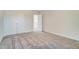 This bedroom has plush carpet flooring and is equipped with a double closet for storage at 6800 Franklin Heights Rd, Cary, NC 27518