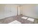 This bedroom has plush carpet flooring and is equipped with a double closet for storage at 6800 Franklin Heights Rd, Cary, NC 27518