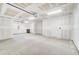 Spacious garage with concrete flooring and drywall, offering a clean and versatile space at 6800 Franklin Heights Rd, Cary, NC 27518