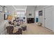 Sitting room with a desk, plush furnishings and natural light at 809 Wayne Dr, Raleigh, NC 27608