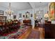 Formal dining room with elegant chandelier and colorful rug at 809 Wayne Dr, Raleigh, NC 27608