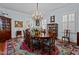 Dining room with hardwood floors and natural light at 809 Wayne Dr, Raleigh, NC 27608