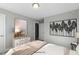 Cozy bedroom featuring serene decor, large picture window, and ample natural light at 73 Merle Dr, Wendell, NC 27591