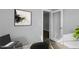 Office space featuring modern art and a doorway, creating a bright and functional work environment at 54 Merle Dr, Wendell, NC 27591