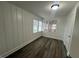 Room with modern floor and wainscotting at 102 Sue Ave, Dunn, NC 28334