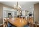 View of dining room showing open floor plan to kitchen and living room at 11424 Horsemans Trl, Raleigh, NC 27613