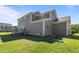 Expansive backyard featuring lush lawn and private deck at 124 Brookstone Way, Angier, NC 27501