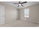 Bedroom with neutral walls, carpeted flooring, and natural light from a window at 124 Brookstone Way, Angier, NC 27501