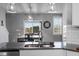 Bright kitchen sink area, dining space with view to outdoors at 124 Brookstone Way, Angier, NC 27501