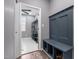 Convenient mudroom entry offers a bench and coat rack at 124 Brookstone Way, Angier, NC 27501