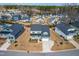 Stunning aerial view of a well-planned neighborhood showcasing meticulously landscaped homes and tree-lined streets at 124 Ferrell W Rd, Apex, NC 27523