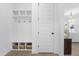 Organized entryway features built-in storage cubbies, hooks, and convenient bench seating at 124 Ferrell W Rd, Apex, NC 27523