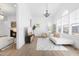Inviting living room featuring a cozy fireplace, neutral color palette, hardwood floors, and stylish contemporary furniture at 124 Ferrell W Rd, Apex, NC 27523