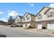 A row of inviting townhomes with well-manicured lawns and private garages at 1306 Plexor Ln, Knightdale, NC 27545