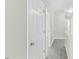 Hallway featuring hardwood flooring and natural light at 1306 Plexor Ln, Knightdale, NC 27545