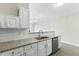 Featuring granite counters, stainless appliances, and subway tile backsplash at 1306 Plexor Ln, Knightdale, NC 27545