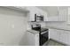Efficient kitchen layout with stainless steel appliances and convenient storage at 1306 Plexor Ln, Knightdale, NC 27545