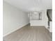 Open-concept living room featuring hardwood floors and stairs to the second floor at 1306 Plexor Ln, Knightdale, NC 27545