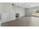 Spacious living room features lots of space, adjacent to kitchen, and wood floors at 1306 Plexor Ln, Knightdale, NC 27545