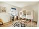 Bright bedroom featuring a playful treehouse bed, decorative rug, and ample natural light at 14 Winchester Ct, Durham, NC 27707