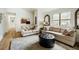 Inviting living room with plush seating, decorative mirrors, and modern accents at 14 Winchester Ct, Durham, NC 27707