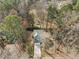 An aerial shot showcases the property, its placement, and the surrounding landscape at 1404 Vanguard Pl, Durham, NC 27713