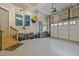 Spacious garage with epoxy flooring, ample storage, and a garage door opener, perfect for vehicles and hobbies at 1404 Vanguard Pl, Durham, NC 27713