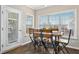 Eat-in dining space features a wood table with seating for four and bright natural light at 1421 Harvey Johnson Rd, Raleigh, NC 27603