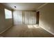 Spacious bedroom offers natural light and ample storage with double closets at 1517 Peace St, Henderson, NC 27536