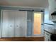 Kitchen pantry features a glass door and complements the modern design of the kitchen at 1517 Peace St, Henderson, NC 27536
