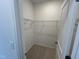 Walk-in closet with metal shelving for efficient storage at 1573 Wendell Valley Blvd, Wendell, NC 27591
