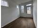 Cozy entryway with wood floors featuring a glass door and multiple windows allowing natural light at 1581 Wendell Valley Blvd, Wendell, NC 27591