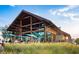 Beautiful exterior of an outdoor restaurant featuring wood beams, stone accents, and stylish seating at 1581 Wendell Valley Blvd, Wendell, NC 27591