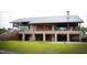 Stunning exterior of a stone and timber commercial building surrounded by green grass at 1581 Wendell Valley Blvd, Wendell, NC 27591