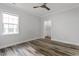 Cozy bedroom with a ceiling fan and ample closet space at 163 English Violet Lane Ln, Raleigh, NC 27610