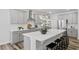 Stylish kitchen featuring a spacious island, stainless steel appliances, and modern cabinetry at 163 English Violet Lane Ln, Raleigh, NC 27610