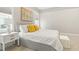 Well-lit bedroom with a large window, showcasing serene decor and comfortable furnishings for a relaxing space at 1737 Fence Post Rd, Wendell, NC 27591
